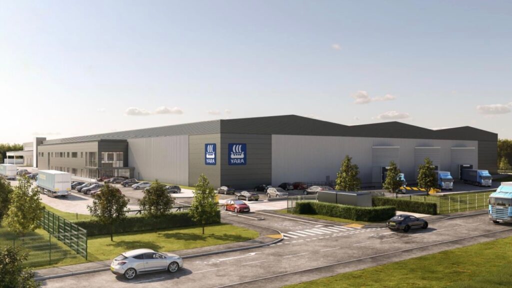 Artists impression of Yara's new global production plant. A large building and car park with Yara logos on the building