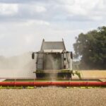 combine harvester at work in a field
