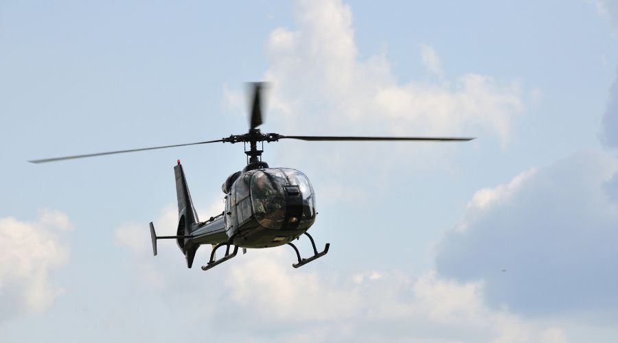 A helicopter landed on Johnny Kilcullen’s field to get erial footage of the sinking of the MV Shingle ship in Killala Bay.