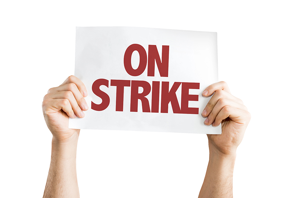 stock photo sign that reads 'on strike'