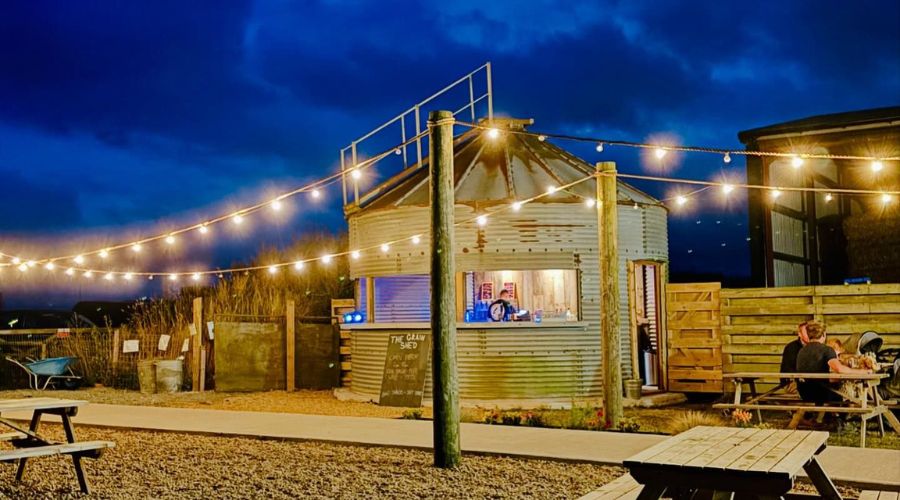 The owners of a Suffolk campsite, Pigs in Blankets, had an unusual idea to turn an old grain silo into a bar, The Grain Shed.