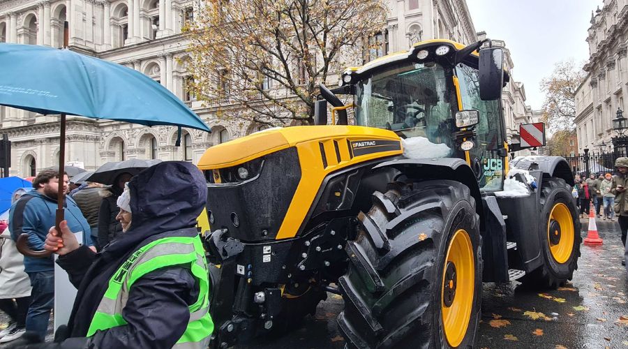 JCB tractor parked outside parliament 