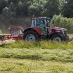 Kverneland butterfly mower in grass field