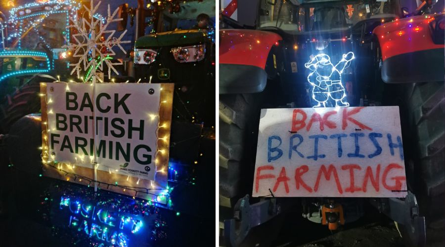 two lit up tractors with Back British Farming signs on the front 