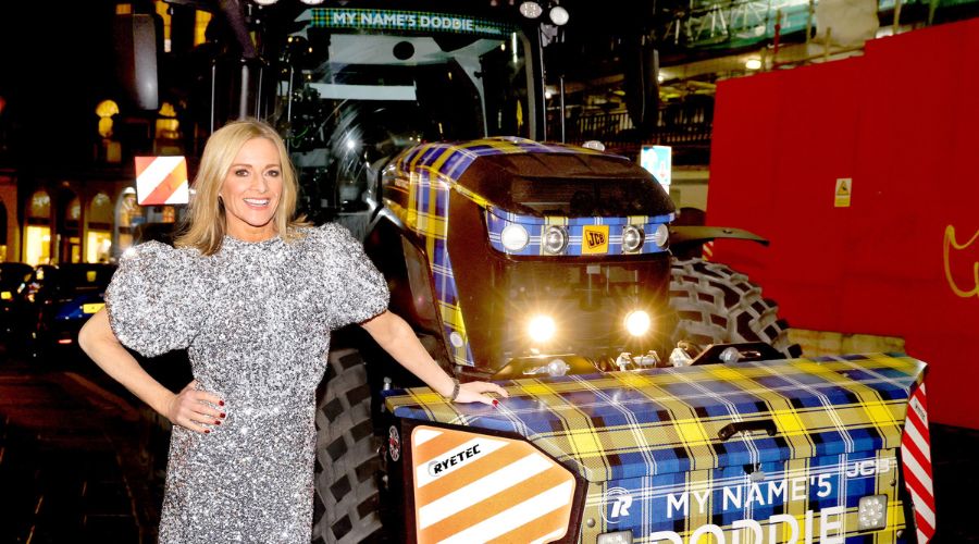 Scottish rugby player Kenny Logan drove his wife Gabby Logan to My Name’5 Doddie Foundation awards in Doddie Weir tartan-clad JCB Fastrac.