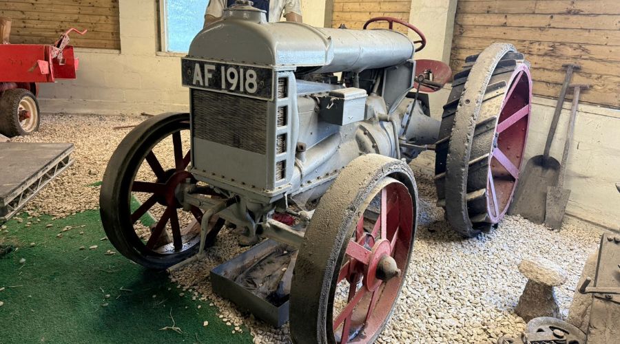 light blue fordson model f tractor with AF 1918 on the front 