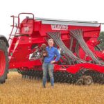 Tom Matthews standing in front of Weaving Machinery drill