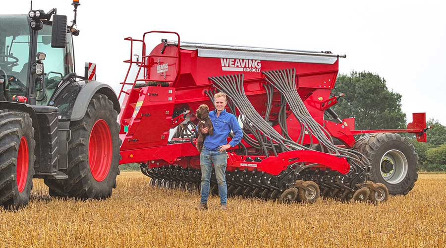 Tom Matthews standing in front of Weaving Machinery drill