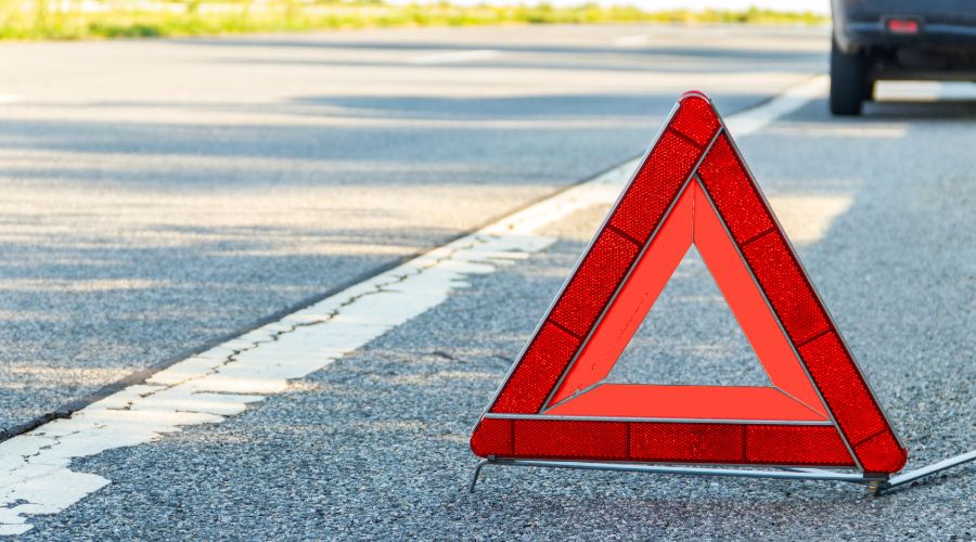 Two people have been taken to the hospital following a crash involving two cars and a tractor near Newmarket in Suffolk.