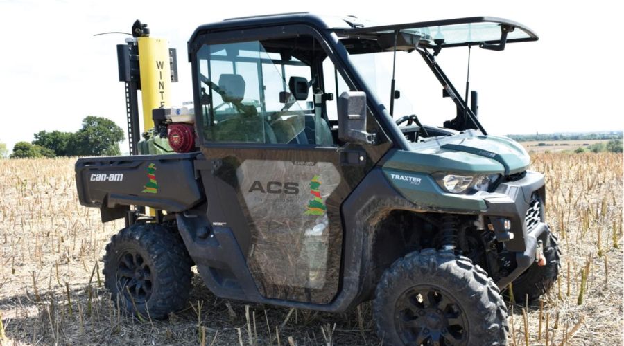 can am vehicle in a field with ACS decal