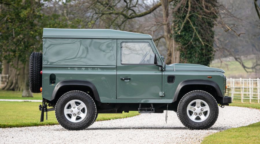 side view of Keswick green Land Rover defender 90