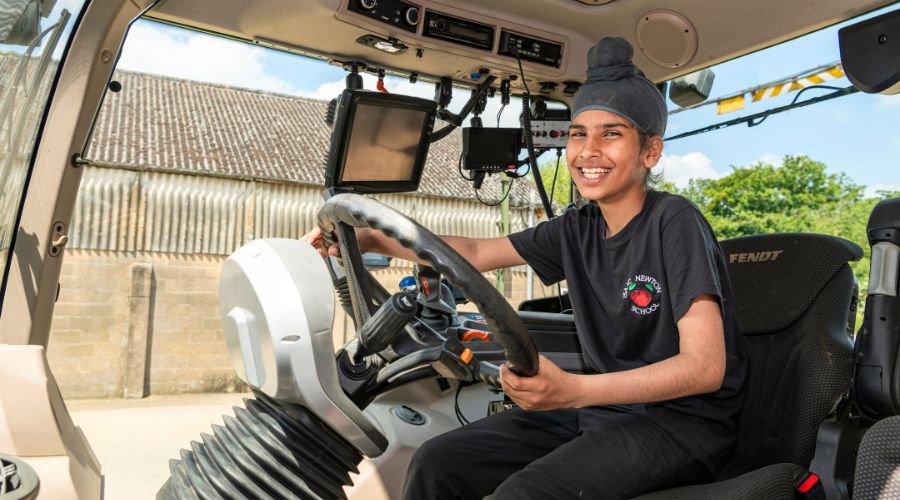 The Country Trust engages children in agricultural life, showing them machinery so they can learn about problem-solving and engineering.